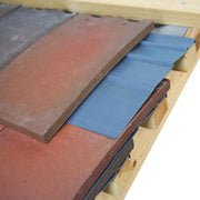 An image of a Permavent Plain Easy Strip in Grey on a roof to show where they are installed.  These are used to install tiles on lower pitched roofs.