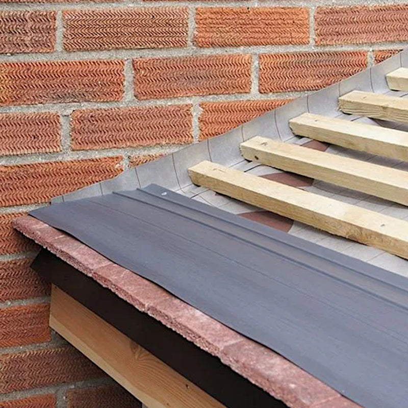 An image of a Permavent Plain Easy Strip in Grey on a roof to show where they are installed.  These are used to install tiles on lower pitched roofs.