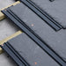 An image of Permavent Easy Slate low roof pitch system being used under a slate to show where they are fitted.