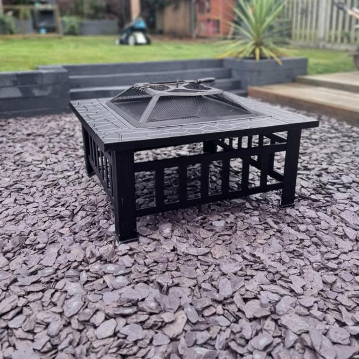 An image of Plum Slate stone and what it looks like when laid as a garden patio.