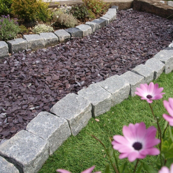 An image of Plum Slate stone and what it looks like when laid as a garden path.