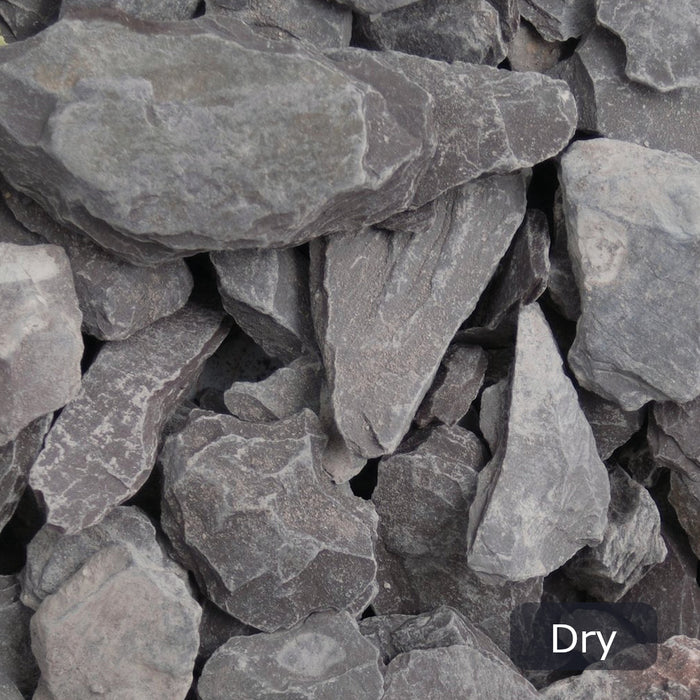 An image of Plum Slate stone and what it looks like when dry.