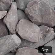An aggregate image of Plum Slate paddle stones when dry