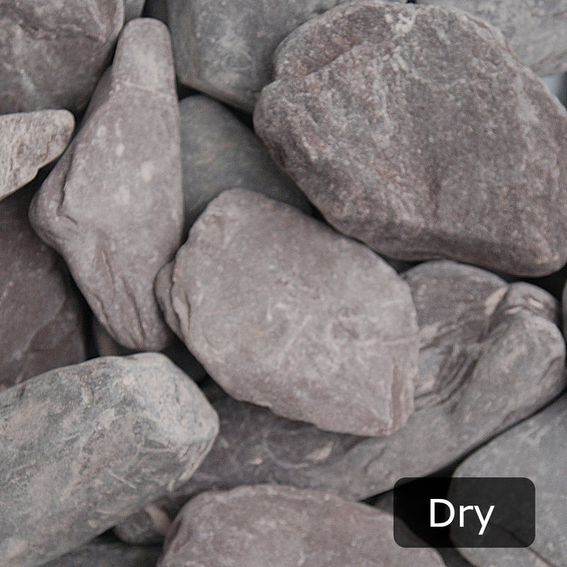 An aggregate image of Plum Slate paddle stones when dry