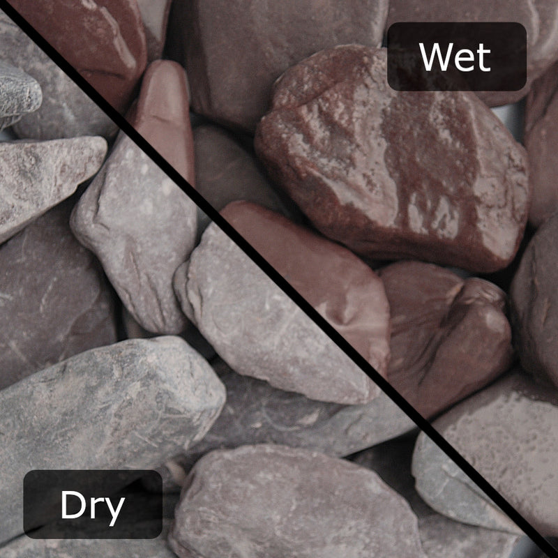 An image of Plum Slate gravel stones with a diagonal split down showing them wet and dry