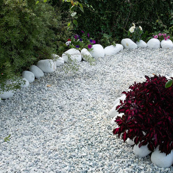 An image of Polar White garden Stones and what they look like when laid out as a garden path