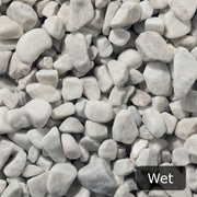 An aggregate image of Polar White Pebble stones when wet