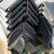 An image showing a stack of Premium Clay Universal Angle Capped Ridge 90 / 135 Degree in Black