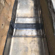 An image of Premium Lead expansion joints with a Black flexible middle being used on a roof