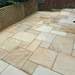 An image of Raj Green Indian Standstone Paving laid out to show what it looks like.