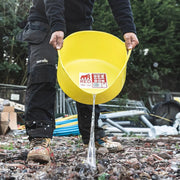 Image of a Red-Gorilla Small Shallow Tub Yellow with a 15 litre capacity being used to move and pour away water.