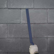 Image of a Slate Ripper tool made from Forged Steel being used to cut nails / pegs under slates.