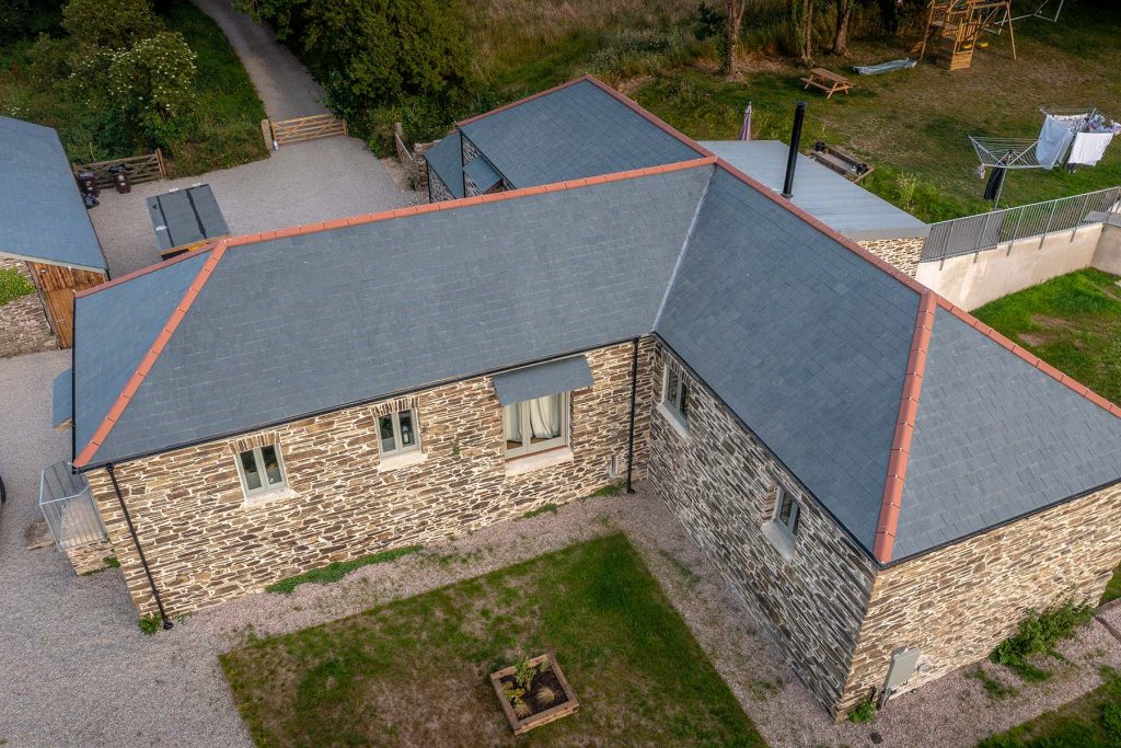 An Ariel image of SSQ Riverstone Ultra slate tiles on a roof to show the finish