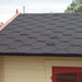 An image of a shed roof hat has been fitted with Hexagonal felt Shingles in Midnight Black.