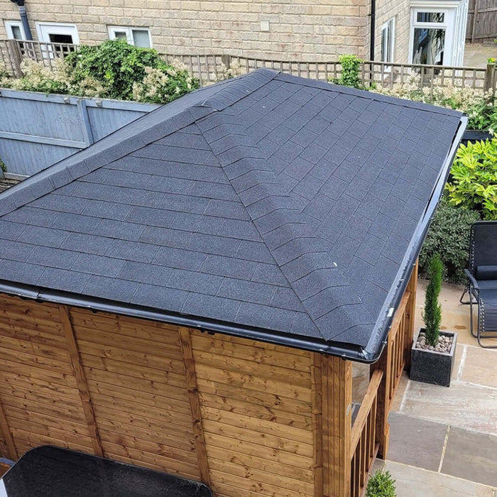 An image of a shed roof hat has been fitted with Square felt Shingles in Midnight Black.