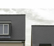 An image of roofs that has been fitted with SVK Ardonit Fibre Cement Slates.