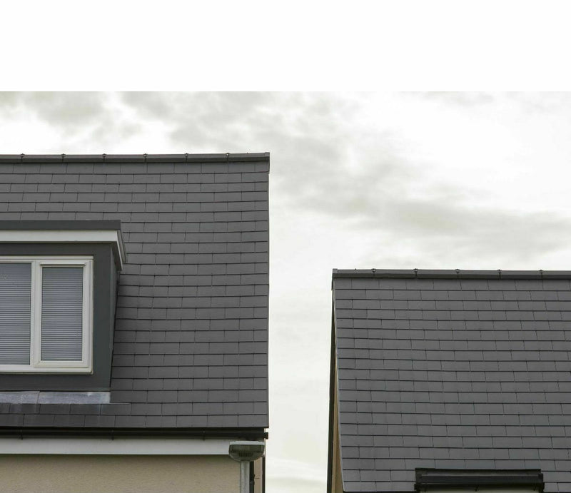 An image of roofs that has been fitted with SVK Ardonit Fibre Cement Slates.