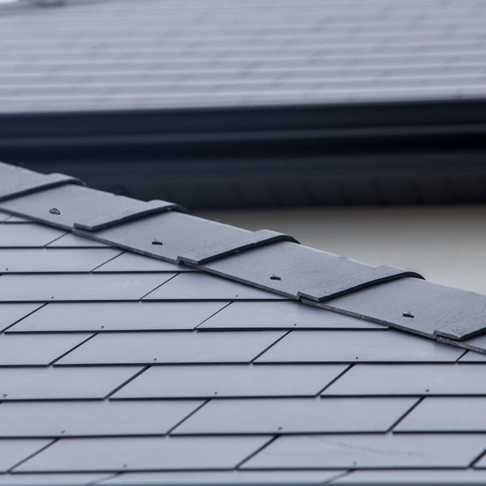 Image of a roof with SVK Fibre Cement Plain Angle Ridge Tiles on them.