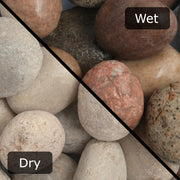 An image showing Scottish Cobble Stone Aggregate Gravel. The image is split horizontally to sow the difference between wet and dry.