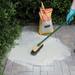 An image of Sika Setting sand being swept into gaps in block paving