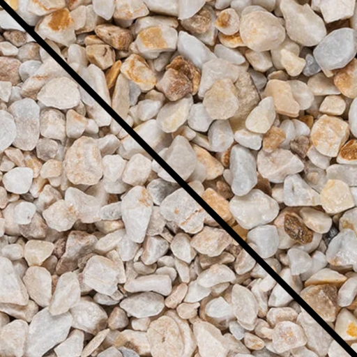 An image showing Spanish Gold Marble Stone Aggregate Gravel. The image is split horizontally to show the difference between wet and dry.