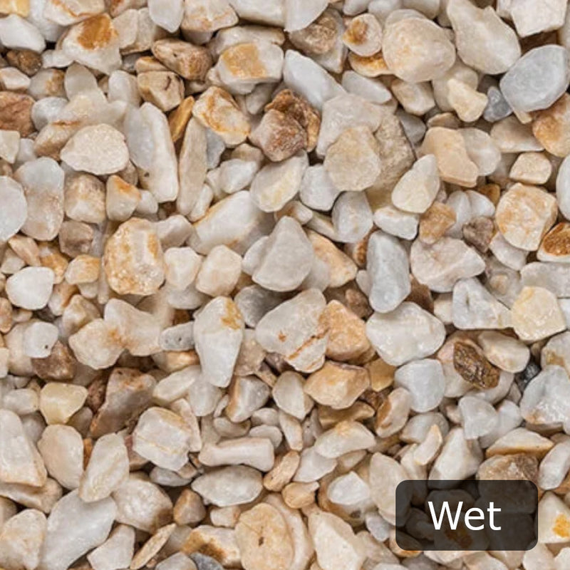 An image showing Spanish Gold Marble Stone Aggregate Chippings when Wet