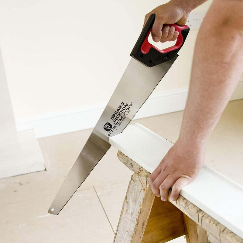 An image of a Spear and Jackson Predator Universal Saw (PPI8) being used to cut wood.