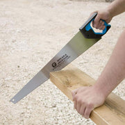 An image of a Spear and Jackson Predator First Fix Saw (PPI 7) being used to cut wood.