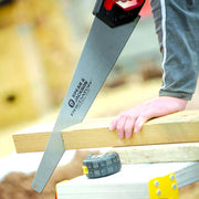 An image of a Spear and Jackson Predator Universal Saw (PPI8) being used to cut wood.