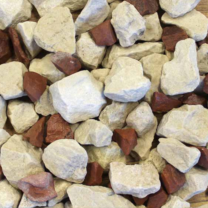 An image of aggregates in the colour Strawberries and Cream in 20mm. They are in whites, Buffs and red granite.