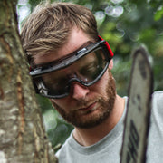 An image of TIMCO Premium Safety Goggles that come in One Size and what they look like when worn.