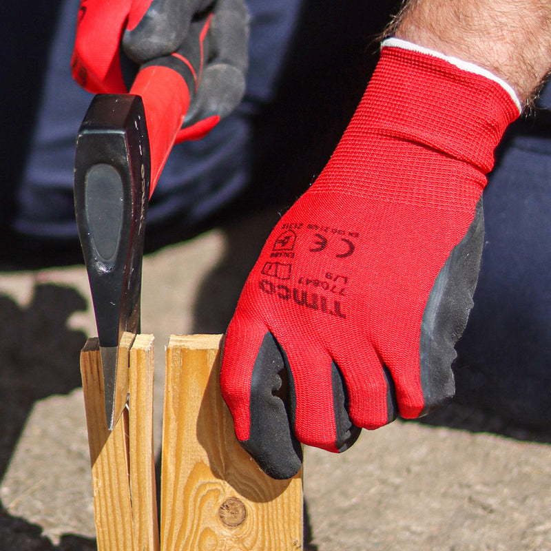 An image showing TIMCO toughlight gloves being used to chop wood with an axe to protect hands.