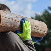 An image of TIMCO warm grip gloves being used to carry a wooden log.