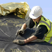 An image showing TLX Gold Thinsulex Multifoil Insulation on a roof.