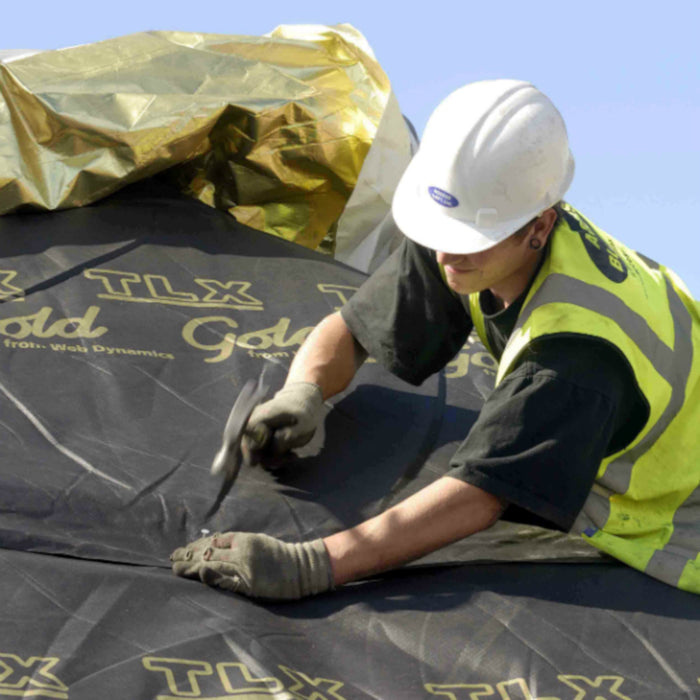 An image showing TLX Gold Thinsulex Multifoil Insulation on a roof.