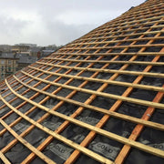An image showing TLX Gold Thinsulex Multifoil Insulation on a roof.
