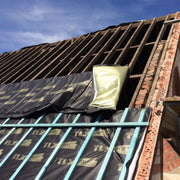 An image showing TLX Gold Thinsulex Multifoil Insulation on a roof.