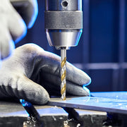 An image of Timco TCT multi purpose drill bits being used to drll into metal.