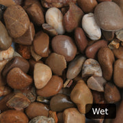 An image showing Scottish Pebble Stone Aggregate Gravel when they are wet.