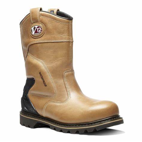 An image of a V12 Tomahawk V1250 Waterproof Rigger Boot. It is a light tan colour and has a black heel. It is against a white background