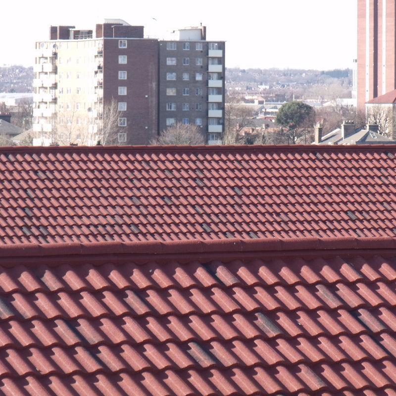 An image showing a roof with Villatile Lightweight Roofing with Ridge Closures 