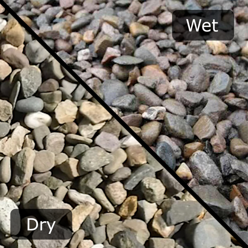 An image of aggregates in the colour Welsh Brown, can be used as drainage gravel. They are 20mm in size. They are a mix of brown and grey tones and are very natural looking.