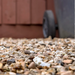 An image of aggregates in the colour Welsh Brown, can be used as drainage gravel. They are 20mm in size. They are a mix of brown and grey tones and are very natural looking.