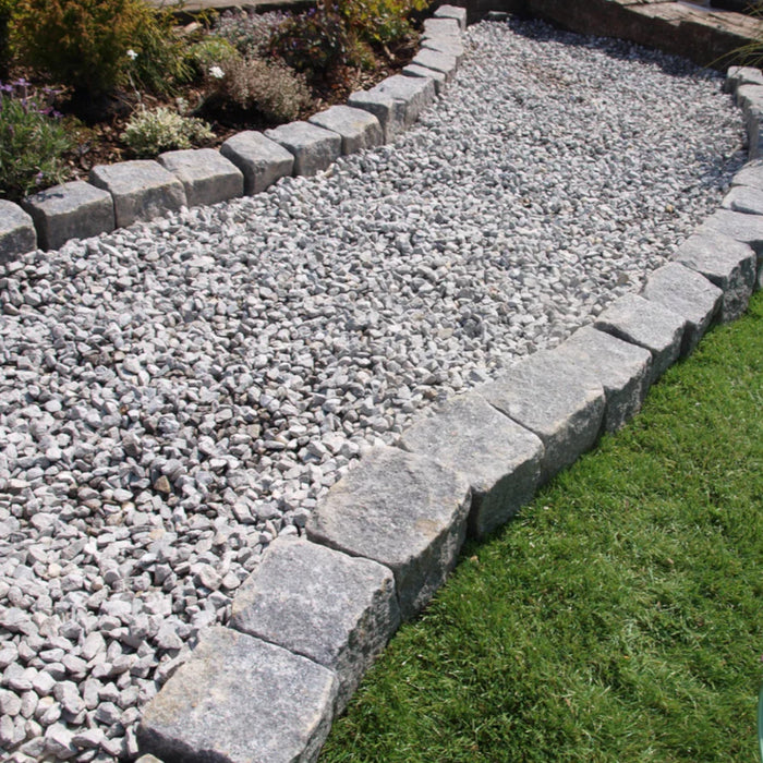 An image of White Limestone and what it looks like when used as a path.