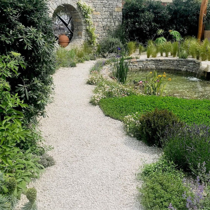 An image of White Limestone and what it looks like when used as a path.