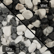 An image showing Zebra Pebble Stone Aggregate Gravel. The image is split horizontally to sow the difference between wet and dry.
