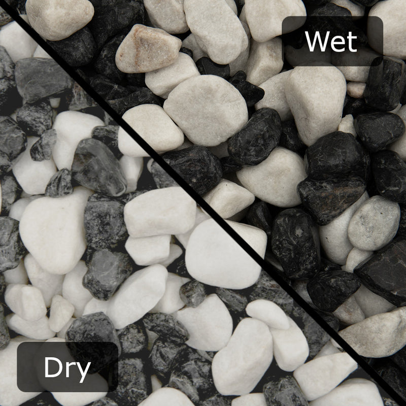 An image showing Zebra Pebble Stone Aggregate Gravel. The image is split horizontally to sow the difference between wet and dry.