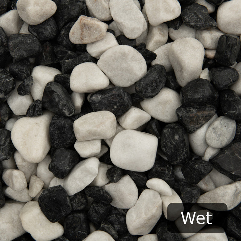 An image showing Zebra Pebble Stone Aggregate Gravel when they are wet.