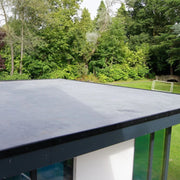 An image showing a flat roof fitted with Classicbond 1.2mm EPDM Rubber Roofing Membrane.