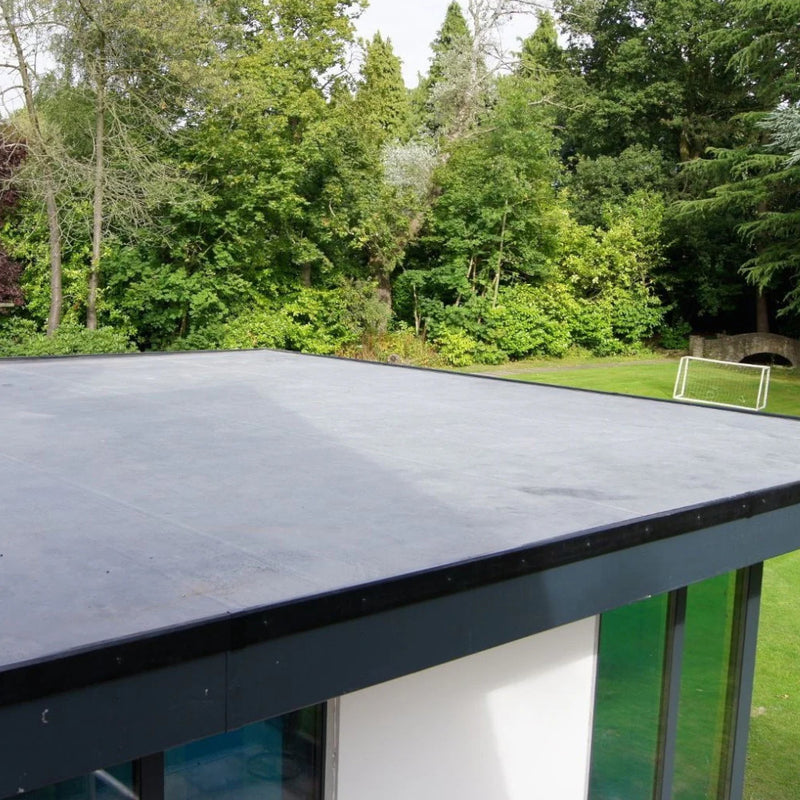 An image showing a flat roof fitted with Classicbond 1.2mm EPDM Rubber Roofing Membrane.